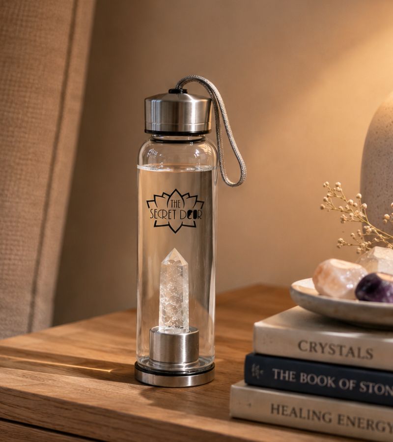 Clear Quartz Crystal Elixir Water Bottle on Bedside Table