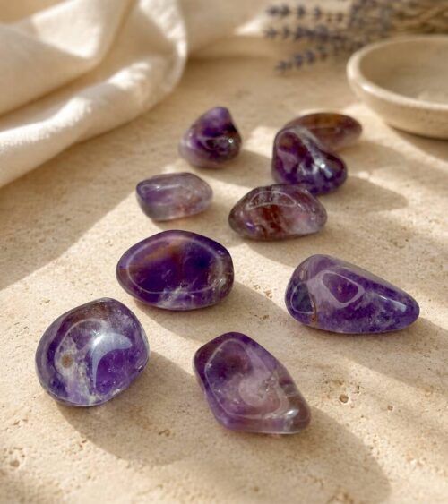 Ametrine Crystal Chunks on Stone Surface