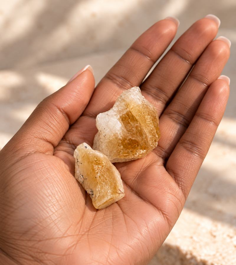 Two Large Citrine Crystals in the Palm of Hand