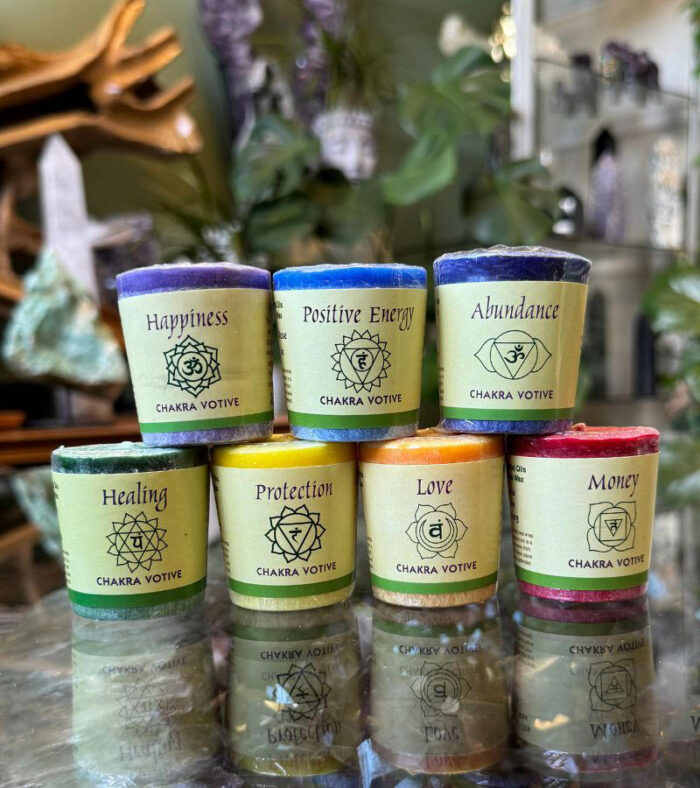 Experience the power of intention and manifest your desires with these beautiful, purpose-driven essential oil infused chakra votive candles.