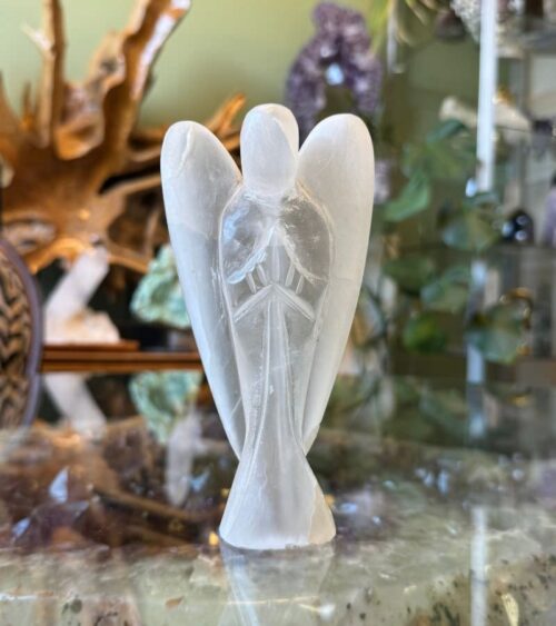 Elevate your spiritual practice with our exquisite Selenite Crystal Angel. Hand-carved from pure Selenite