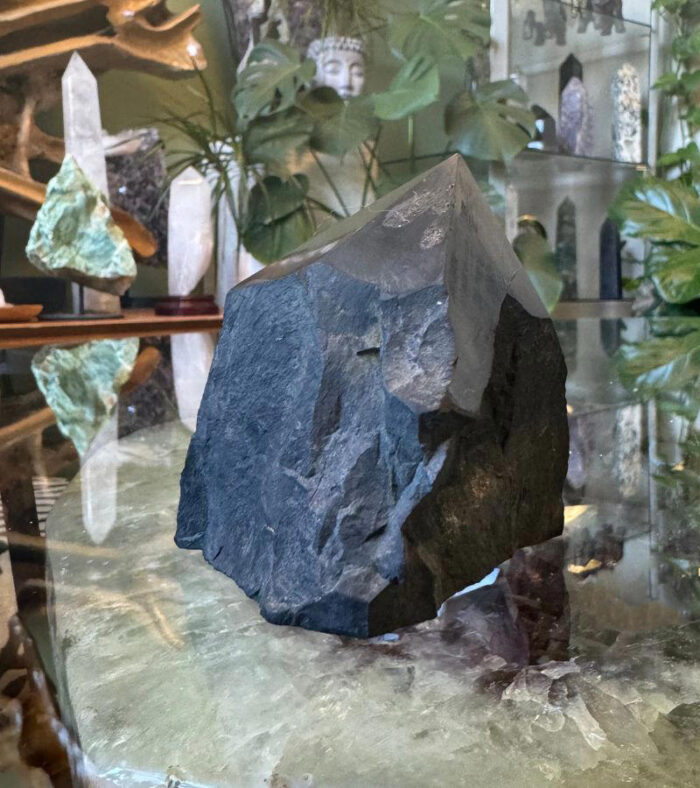 The energy of a Raw Base Black Tourmaline Point is protective, grounding, and highly purifying,