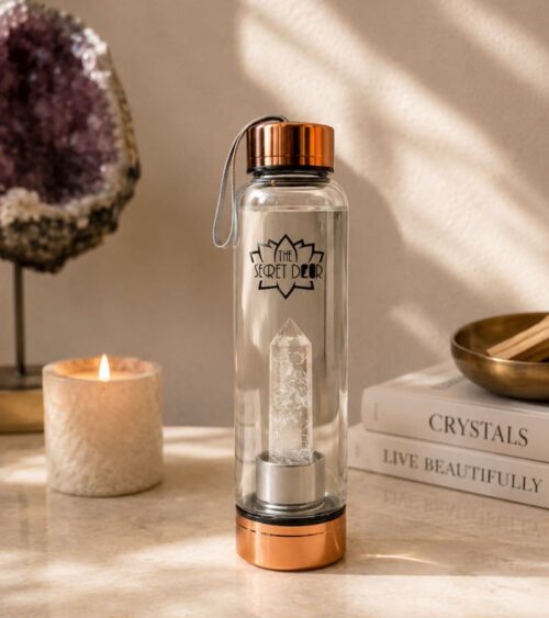 Clear Quartz Crystal Elixir Water Bottle Rose Gold and Candle