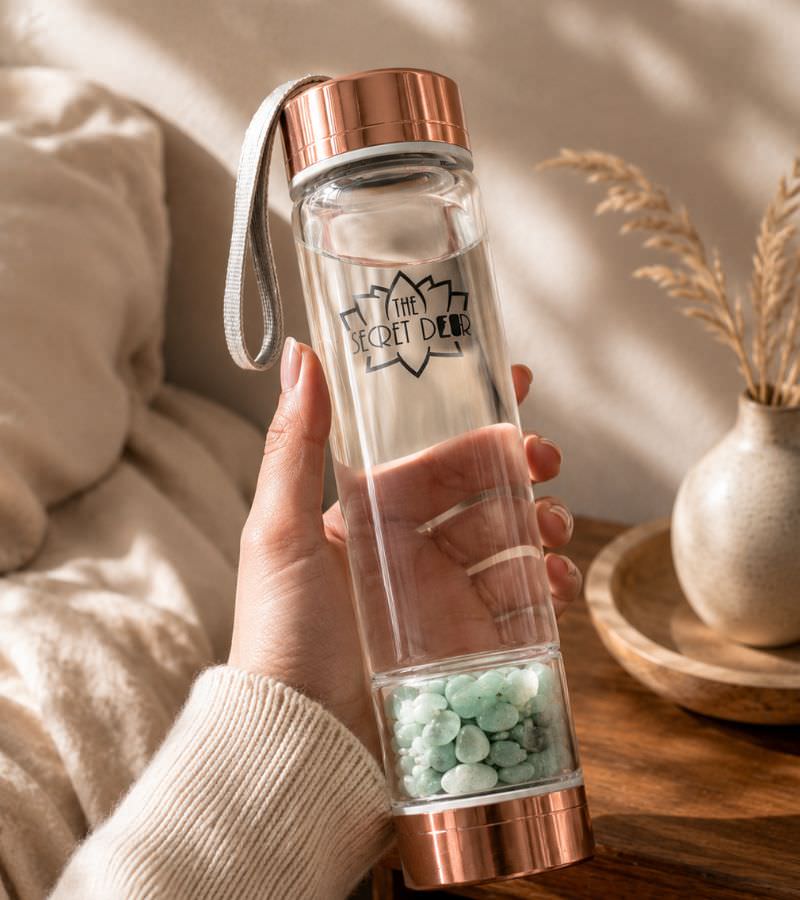 Green Aventurine Crystal Water Bottle in Women's Hand