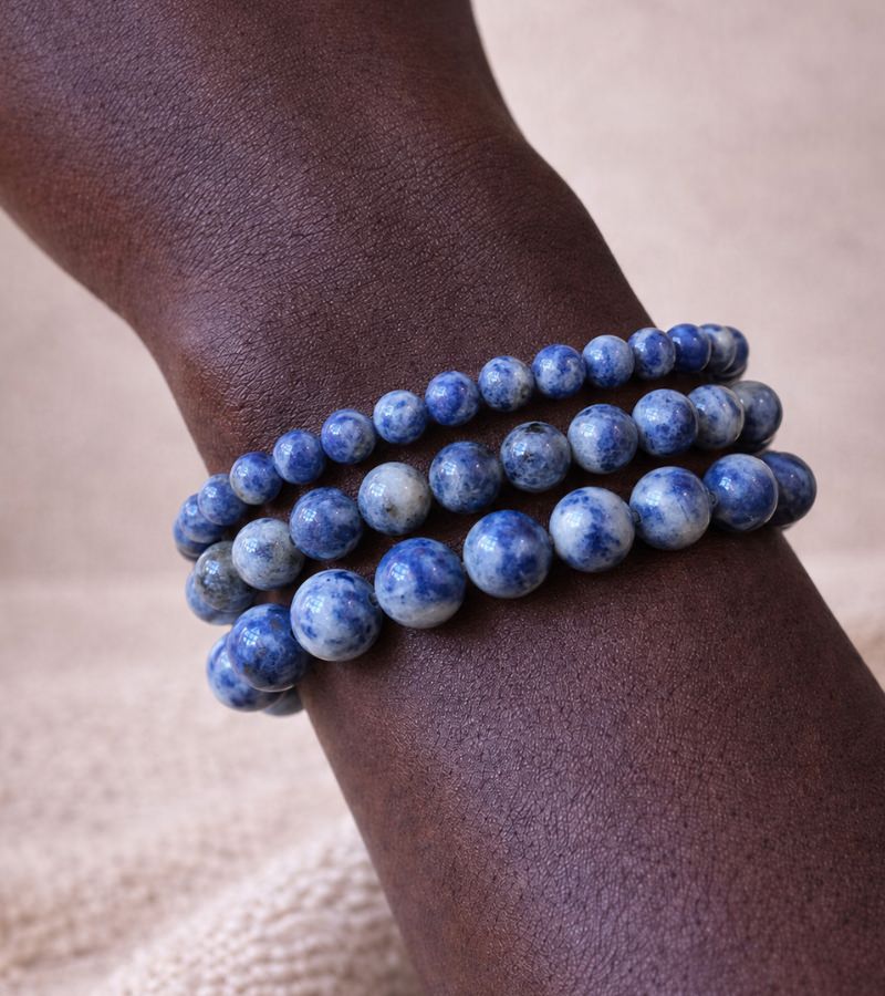 6mm, 8mm, 10mm Spotted Sodalite Crystal Bracelets on Model's Wrist